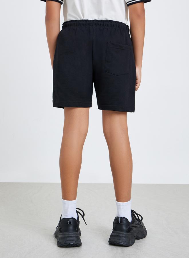 ستايلي شورت مطبع بطبعة كتابة - Image 4